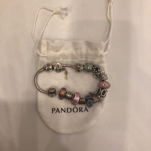 Pandora bracelet with 16 charms, good condition!